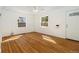 Empty Living Room with hardwood floors, ceiling fan, and lots of light at 2570 Jay St, Edgewater, CO 80214