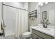 Modern bathroom featuring a shower, bathtub, vanity, and elegant fixtures for a spa-like experience at 5506 Water Avens Dr, Castle Rock, CO 80104