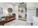 Inviting home entry way with hardwood floors, decor, and adjacent spaces at 5506 Water Avens Dr, Castle Rock, CO 80104