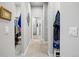 Spacious hallway offers access to a well-organized closet and a luxurious bathroom at 5506 Water Avens Dr, Castle Rock, CO 80104