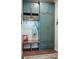 Stylish mudroom boasts custom teal cabinetry, bench seating, and ample storage space for coats and accessories at 5506 Water Avens Dr, Castle Rock, CO 80104
