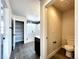 Bathroom with shower, toilet, and linen closet at 4525 Cholla Trl, Castle Rock, CO 80104
