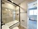 Bathroom with tub and shower, and a view to bedroom at 4525 Cholla Trl, Castle Rock, CO 80104