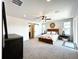 Spacious bedroom with carpeted floors and sliding barn door at 4525 Cholla Trl, Castle Rock, CO 80104