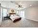 Spacious bedroom with plush carpet and access to balcony at 4525 Cholla Trl, Castle Rock, CO 80104