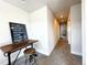 Bright hallway with carpeted floors and access to other rooms at 4525 Cholla Trl, Castle Rock, CO 80104