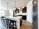 Eat-in kitchen with island seating and stainless steel appliances at 4525 Cholla Trl, Castle Rock, CO 80104