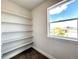 Storage room with shelves and window offering natural light at 4525 Cholla Trl, Castle Rock, CO 80104