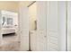 Bright laundry area with washer in the closet, located just off the bedroom at 8039 Lee Dr # 2, Arvada, CO 80005