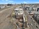 A street level view of the city with visible parking, surrounding buildings, and rooftop patio at 2715 Blake St # 304, Denver, CO 80205