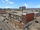 Urban building aerial view with mountain and city skyline views at 2715 Blake St # 304, Denver, CO 80205