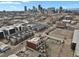 A beautiful aerial shot showcasing the Denver skyline, parking, and other apartment buildings at 2715 Blake St # 304, Denver, CO 80205