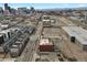 A beautiful aerial shot showcasing the Denver skyline, parking, and other apartment buildings at 2715 Blake St # 304, Denver, CO 80205