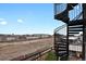 Balcony with a spiral staircase offering city views and outdoor space at 2715 Blake St # 304, Denver, CO 80205