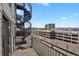 This balcony includes city views and spiral staircase offering a cozy outdoor retreat at 2715 Blake St # 304, Denver, CO 80205