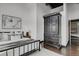 Comfortable bedroom with modern décor, natural light, and an elegant wardrobe at 2715 Blake St # 304, Denver, CO 80205