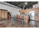 Spacious kitchen with stainless steel appliances, granite countertops, and a center island with barstools at 2715 Blake St # 304, Denver, CO 80205