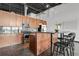Stylish kitchen boasts modern appliances, granite countertops, and a functional island with barstool seating at 2715 Blake St # 304, Denver, CO 80205