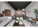 Spacious open floor plan that connects the living room to the kitchen and dining area at 2715 Blake St # 304, Denver, CO 80205