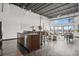 Bright, open-concept living area features high ceilings, modern finishes, and a spacious island at 2715 Blake St # 304, Denver, CO 80205