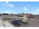 Rooftop deck offering ample seating and dining spaces with a beautiful city skyline view at 2715 Blake St # 304, Denver, CO 80205