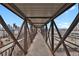 Elevated walkway offers unique perspective, connecting the building to city views and surroundings at 2715 Blake St # 304, Denver, CO 80205