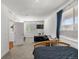 Bedroom boasting natural light, neutral carpet, and an adjoining room at 15920 Buffalo Run Dr, Commerce City, CO 80022