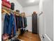 Organized walk-in closet with built-in shelving and plenty of space for storage at 15920 Buffalo Run Dr, Commerce City, CO 80022