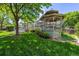 Exterior view of a home, showcasing a gazebo and outdoor patio with lush landscaping at 3145 Stevens Cir, Erie, CO 80516