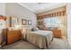 Neutral bedroom with a king bed, three dressers, and light-colored walls at 3145 Stevens Cir, Erie, CO 80516