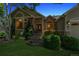 Charming home exterior with stone accents, manicured landscaping, and inviting front entrance at 3145 Stevens Cir, Erie, CO 80516