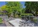 Relaxing outdoor hot tub area with adjacent deck and lush garden, providing a private oasis at 3145 Stevens Cir, Erie, CO 80516