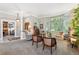 Inviting living room with neutral color palette, bay windows, and plush carpeting at 3145 Stevens Cir, Erie, CO 80516