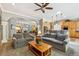Open floor plan displaying a living room leading into the kitchen and dining area at 3145 Stevens Cir, Erie, CO 80516