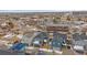 Aerial view of a house and neighborhood with surrounding businesses and streets at 10092 Flower St, Broomfield, CO 80021
