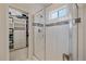 Bathroom with walk-in shower, and a large closet at 10092 Flower St, Broomfield, CO 80021