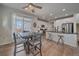Eat-in kitchen with stainless steel appliances and island at 10092 Flower St, Broomfield, CO 80021