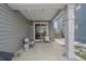 Covered patio with seating area, perfect for outdoor relaxation at 10092 Flower St, Broomfield, CO 80021