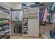 Large walk-in closet with ample shelving and hanging space at 10092 Flower St, Broomfield, CO 80021