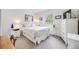 Comfortable bedroom with a queen bed, plush carpeting, and bright natural light at 3058 W 134Th Way, Broomfield, CO 80020