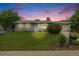 Charming ranch-style home featuring a well-manicured lawn, mature trees, and inviting curb appeal at 3058 W 134Th Way, Broomfield, CO 80020