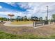 Vibrant playground with slides, climbing structures, and seating areas for Gathering fun at 305 Titan St, Aurora, CO 80011