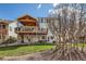 The home features a large deck, a patio, and ample yard space at 2369 Bayberry Ln, Castle Rock, CO 80104