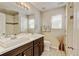 Bathroom with a double vanity and shower at 8071 Tabor St, Arvada, CO 80005