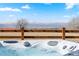A serene hot tub with views of the horizon, perfect for relaxation and enjoying the beautiful scenery at 1931 Marlowe W Cir, Erie, CO 80516