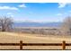 Breathtaking mountain views overlooking the surrounding fields and town at 1931 Marlowe W Cir, Erie, CO 80516