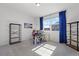 Bright office featuring dual monitors, and a sleek desk, complemented by natural light for enhanced productivity at 1931 Marlowe W Cir, Erie, CO 80516