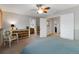 Spacious primary bedroom features a sitting area and access to the ensuite bathroom at 1768 E Jamison Ave, Centennial, CO 80122