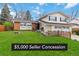 Charming two-story home with a well-manicured lawn, attached two-car garage, and inviting curb appeal at 1768 E Jamison Ave, Centennial, CO 80122