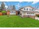 Charming two-story home with a well-manicured lawn, attached two-car garage, and inviting curb appeal at 1768 E Jamison Ave, Centennial, CO 80122